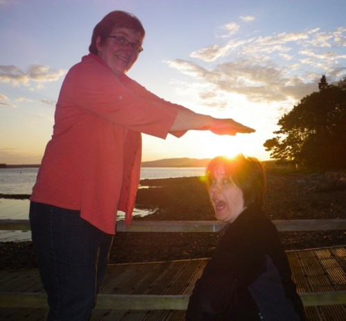 Marly gives Angie a hot sun headache!