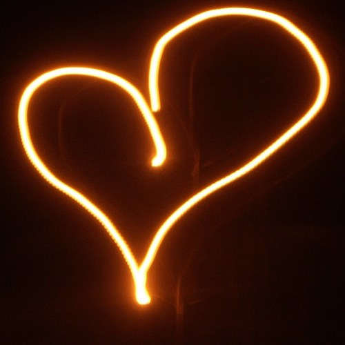 6 or 7 years ago. Drawing a heart with my camera shutter open by the streetlight near my house.